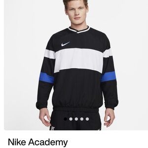 Nike Black and White Lightweight Jacket with Blue Accents